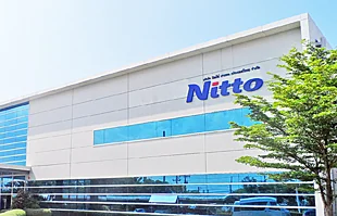 ป้ายติดบนอาคารสูงโรงงาน NITTO ชลบุรี